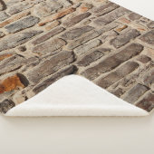 Rustige textuurachtergrond van steenwand sherpa deken (3/4)