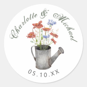 Rustige wilde bloemen in een water kunnen trouwen ronde sticker