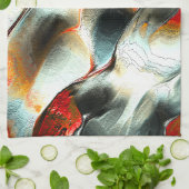 Ruw zilverachtig gesteente over brandend lid, inte theedoek (Gevouwen)