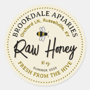 Ruwe honinglabel met vliegende gele bij ronde sticker