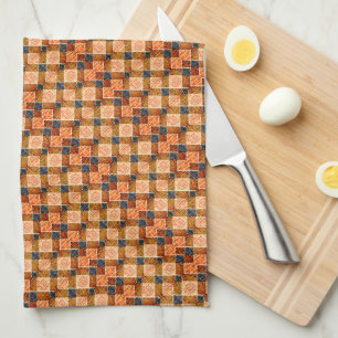 Ruwe oranje schaakdelen die nieuwe vierkante vorme theedoek