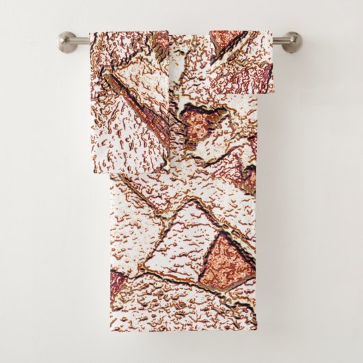 Ruwe steen in roombruin bad handdoek (Insitu)