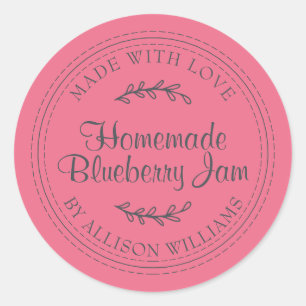 Ruwe zelfgemaakte bosbessenjam inmaken heet roze ronde sticker