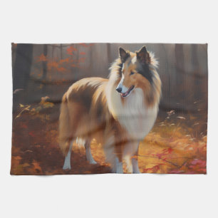 Ruwharige Collie in herfstbladeren val inspireren Theedoek