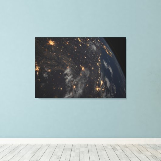 's Avonds licht de stad op de planeet aarde Canvas Afdruk (Insitu (Houten vloer))
