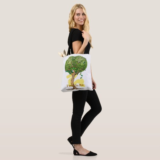 sacola com estampa ecologica de arvore com rosto tote bag (Op model)