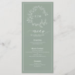 Sage Green Leafy Crest Monogram Weddenschap Menu<br><div class="desc">Creëer de perfecte receptie. We houden van deze trendy, moderne sage groene trouwmenu van 4 x 9 inch! Eenvoudig, elegant, en oh-zo-, hij is voorzien van een handgetekende leafy grot die een modern huwelijksmonogram omringt. Het is gepersonaliseerd in elegante typografie, en geaccentueerd met hand-briefed kalligrafie. Tot slot wordt het in...</div>