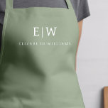 Sage Groen Elegant Modern Minimalistisch Monogram  Schort<br><div class="desc">Verhoog uw culinaire ervaring met onze Classic Elegant Modern Minimalist Monogram Name Cooking Schort. Deze essentiële keuken combineert tijdloze elegantie naadloos met hedendaags minimalisme. Dit schort is met precisie vervaardigd en is niet alleen een praktisch accessoire, maar ook een uiting van persoonlijke stijl. Met het aanpasbare monogram en de naamoptie...</div>