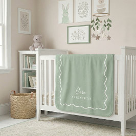 Sagegroene gegolfde rand monogram sherpa deken