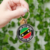 Saint Kitts en Nevis Round Emblem Sleutelhanger (Hand)