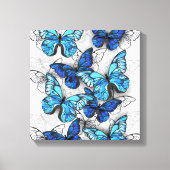 Samenstelling van witte en blauwe vlinders canvas afdruk (Voorkant)