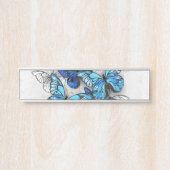 Samenstelling van witte en blauwe vlinders deurbordje (Voorkant)