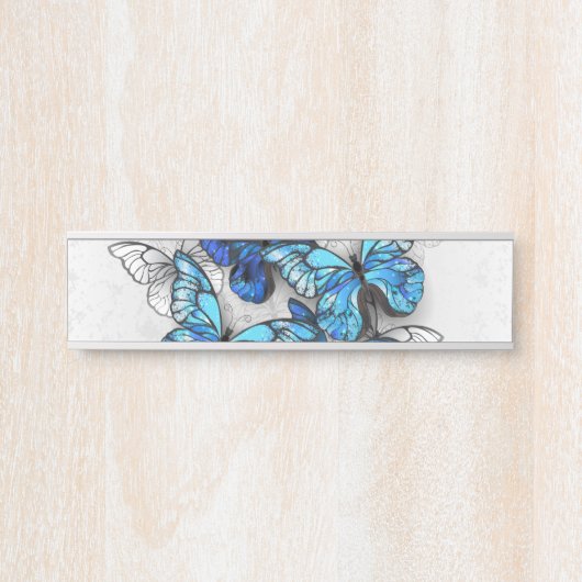 Samenstelling van witte en blauwe vlinders deurbordje (Voorkant)