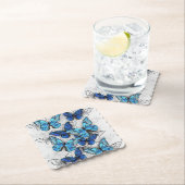 Samenstelling van witte en blauwe vlinders kartonnen onderzetters (Insitu)