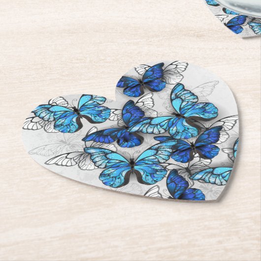 Samenstelling van witte en blauwe vlinders kartonnen onderzetters (Gekanteld)