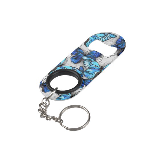 Samenstelling van witte en blauwe vlinders mini flessenopener (Achterkant Gekanteld)