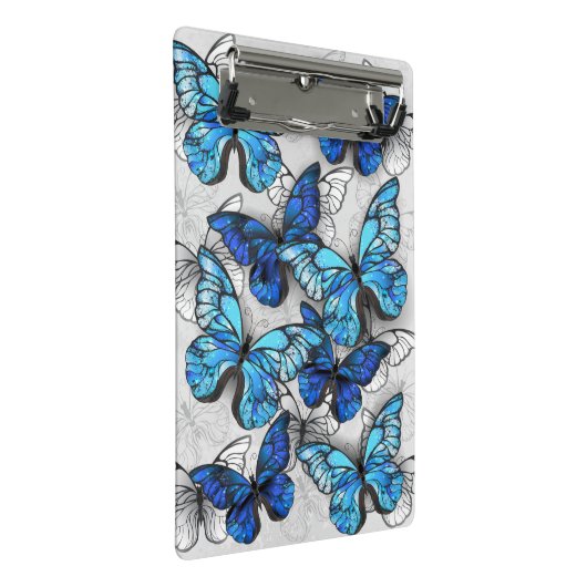 Samenstelling van witte en blauwe vlinders mini klembord (Schuin)