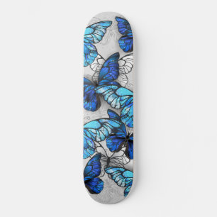 Samenstelling van witte en blauwe vlinders persoonlijk skateboard