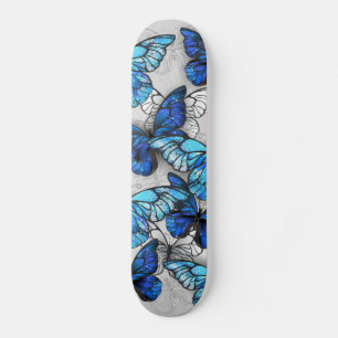 Samenstelling van witte en blauwe vlinders persoonlijk skateboard