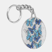Samenstelling van witte en blauwe vlinders sleutelhanger (Voorkant Links)