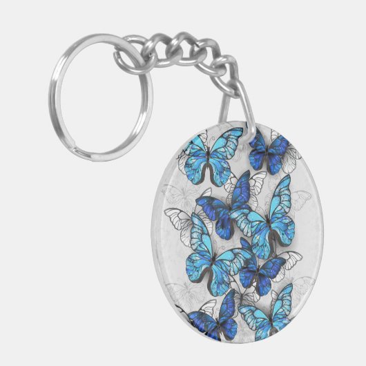 Samenstelling van witte en blauwe vlinders sleutelhanger (Voorkant Links)