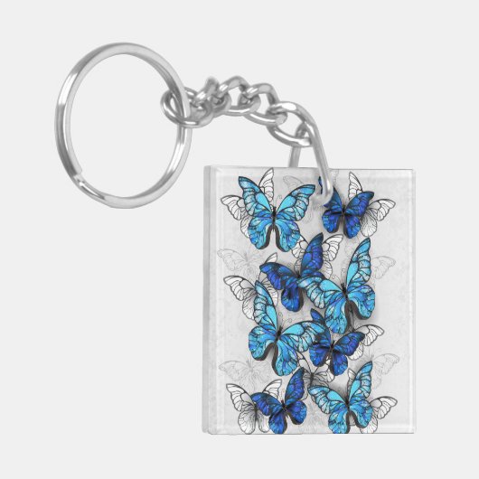 Samenstelling van witte en blauwe vlinders sleutelhanger (Voorkant Links)