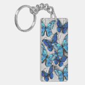 Samenstelling van witte en blauwe vlinders sleutelhanger (Voorkant Links)