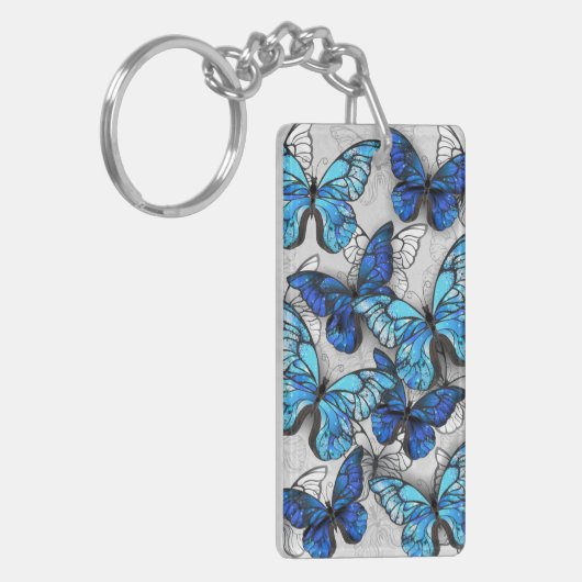 Samenstelling van witte en blauwe vlinders sleutelhanger (Voorkant Links)