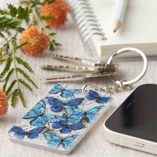 Samenstelling van witte en blauwe vlinders sleutelhanger (Voorkant Rechts)