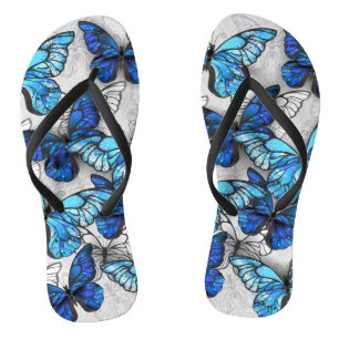 Samenstelling van witte en blauwe vlinders teenslippers