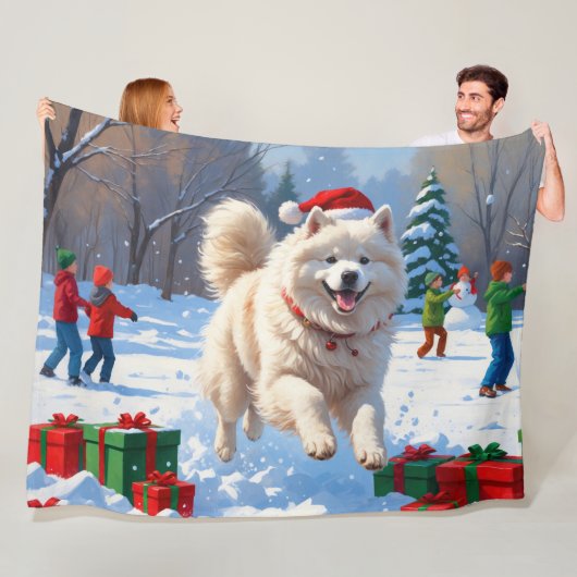 Samojed die in de sneeuw rent met kerstmuts fleece deken (In situ)