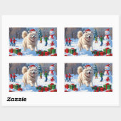 Samojed loopt in de sneeuw met kerstmuts rechthoekige sticker (Vel)