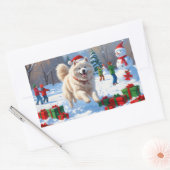 Samojed loopt in de sneeuw met kerstmuts rechthoekige sticker (Envelop)