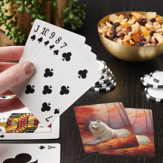 Samojed tussen herfstbladeren inspireert pokerkaarten (Insitu)