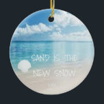 Sand Is The New Snow Beach Christmas Ornament<br><div class="desc">This fun beach living design Sand is the new snow ornament features a beach scene with a seashell. Personalize by adding a year.</div>