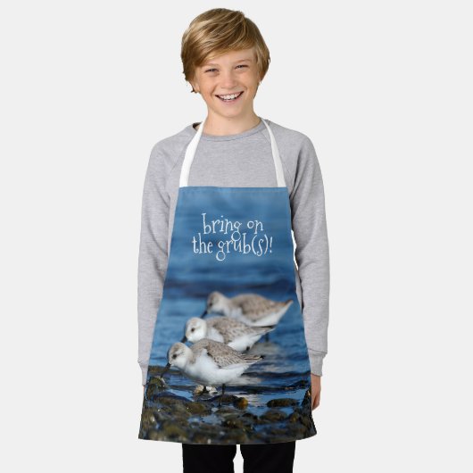 Sanderlings feesten in gespreide synchroniciteit schort (Gedragen)