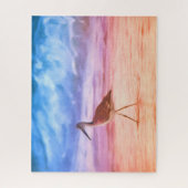 Sandpipers ochtendwandeling op strand tijdens zons legpuzzel (Verticaal)