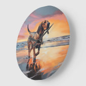 Sandy Paws bloedhond op strand zonsondergang Grote Klok (Hoek)