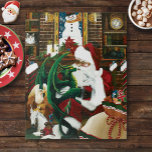Santa Christmas Dragon Fantasie Legpuzzel<br><div class="desc">Kerstman met een jonge groene draak op schoot. Santa's hol is gevuld met een zak speelgoed,  baby griffin,  baby witte eenhoorn en twee katten in boekenplanken. Achter is een open haard,  boekenplanken gevuld met boeken en wandtapijt van een sneeuwman</div>