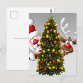 Santa claus en rendier achter een kerstboom.j briefkaart (Voorkant / Achterkant)