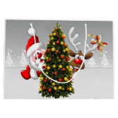 Santa claus en rendier achter een kerstboom.j groot cadeauzakje (Achterkant)
