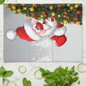 Santa claus en rendier achter een kerstboom.j theedoek (Gevouwen)