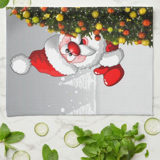 Santa claus en rendier achter een kerstboom.j theedoek (Gevouwen)