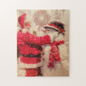 Santa claus en sneeuwpop in sneeuwval legpuzzel (Verticaal)