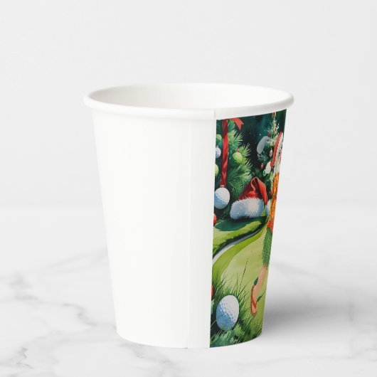 Santa Claus is golfing on Christmas golf course  Papieren Bekers (Rechts)
