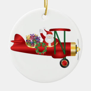 Santa Claus Waving on Biplane with Gifts Ornament