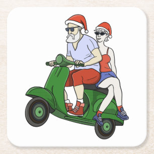 Santa en mevrouw Claus rijden op een scooter Kartonnen Onderzetters