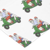 Santa en mevrouw Claus rijden op een scooter Medium Tafelloper (Hoek)