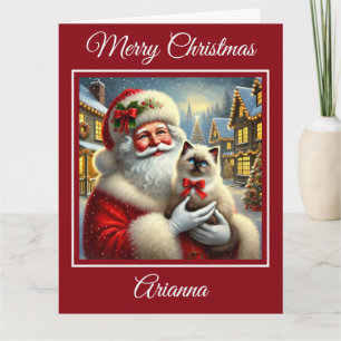 Santa en Ragdoll Kitten in het kerstdorp Kaart