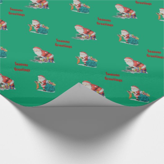 Santa en speelgoedartikelen voor kerstcadeautjes cadeaupapier (Hoek)